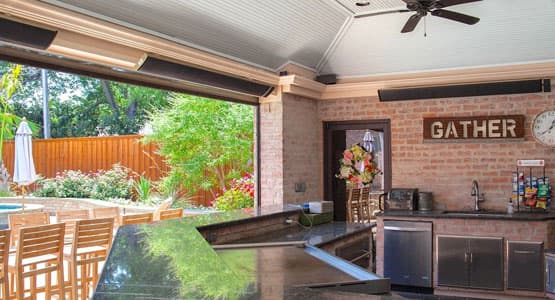radtec heaters installed on the open wall of a covered outdoor kitchen