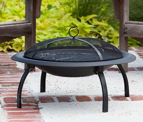 folding fire pit in backyard