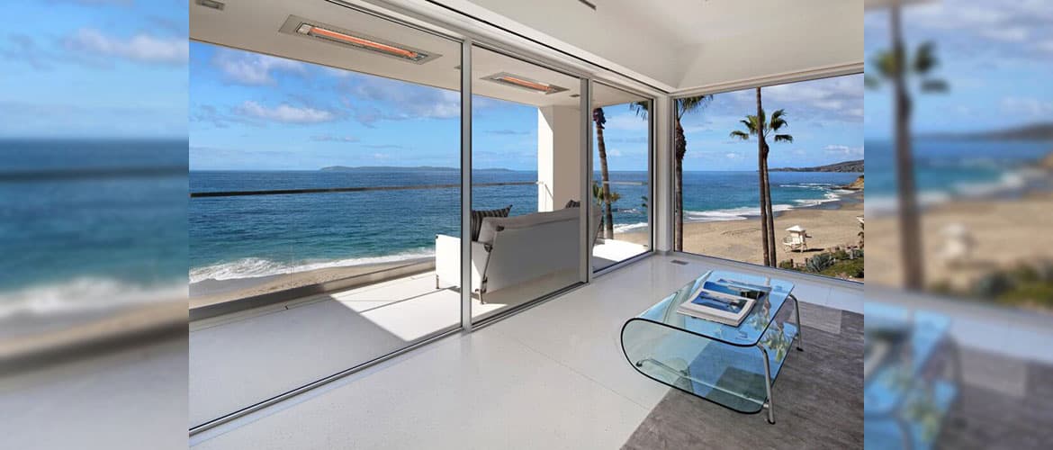 Two Electric Patio Heaters Flush Mounted Into the Ceiling Of a Small Outdoor Patio Overlooking the Ocean